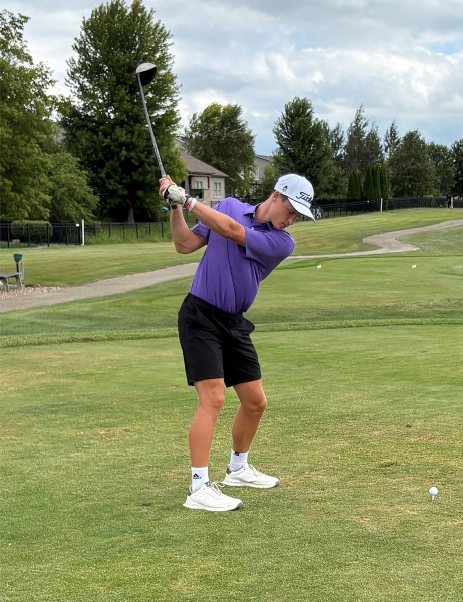 Junior Sam Stauter tees off earlier this season at The Den. The EPG boys team just missed finishing first.