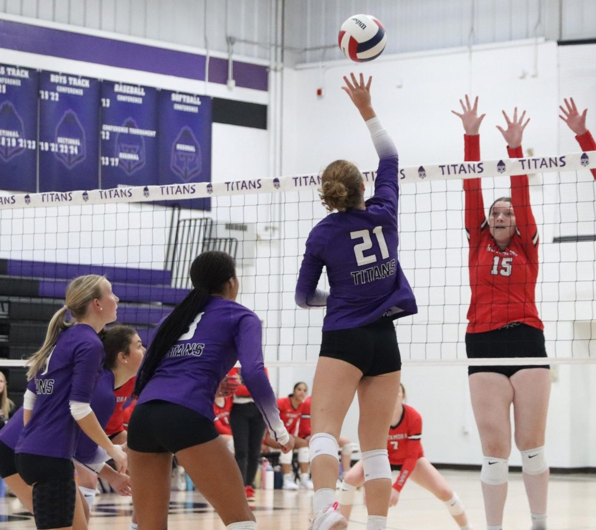 Sophomore Lily Wettstein returns the ball against Metamora