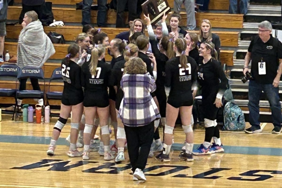 Mrs. Reinkensmeyer gets an upclose shot of the volleyball team.