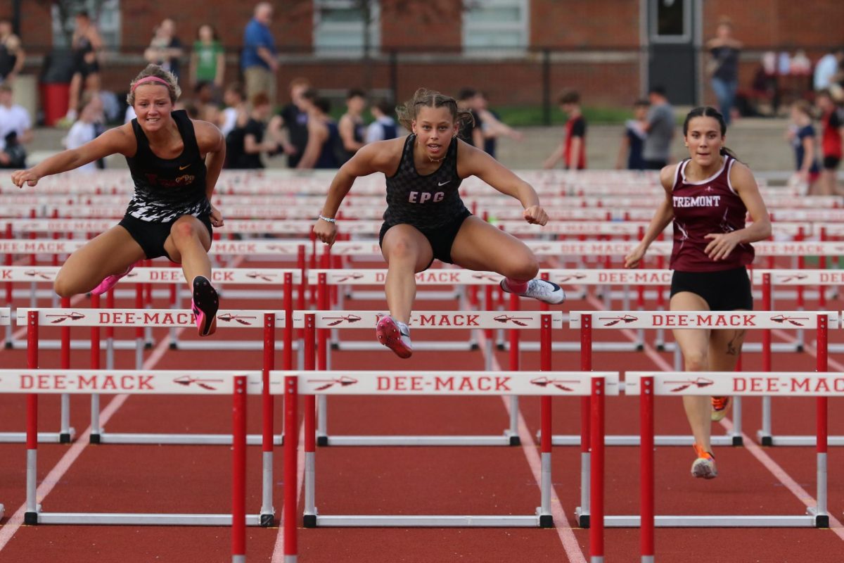 Senior Keyli Cogdal competes in the hurdles.